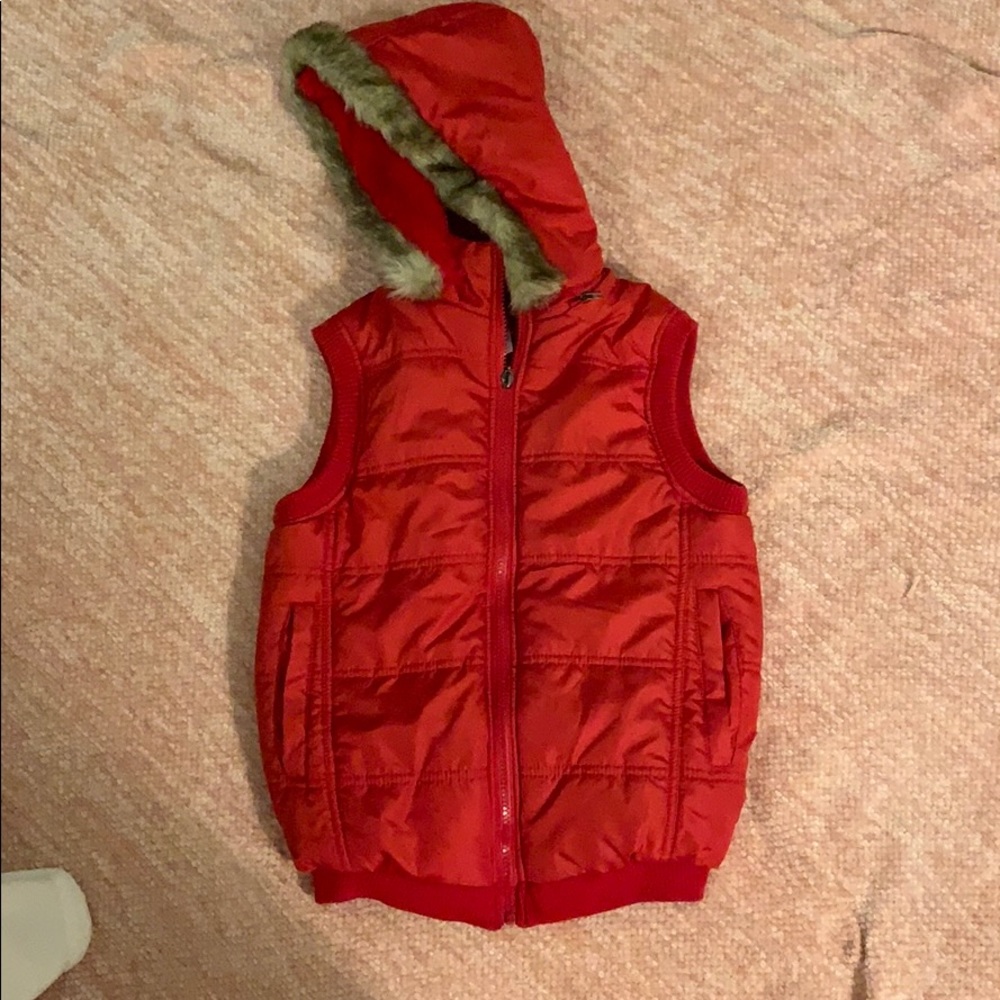 Red fur lined zip up vest with removable fur hood